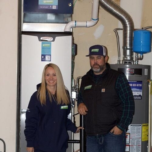 Greens Gives Back recipient Carly Cash with Shawn from Greens Heating and AC.